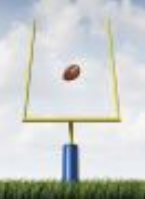 picture of football flying into football hoop